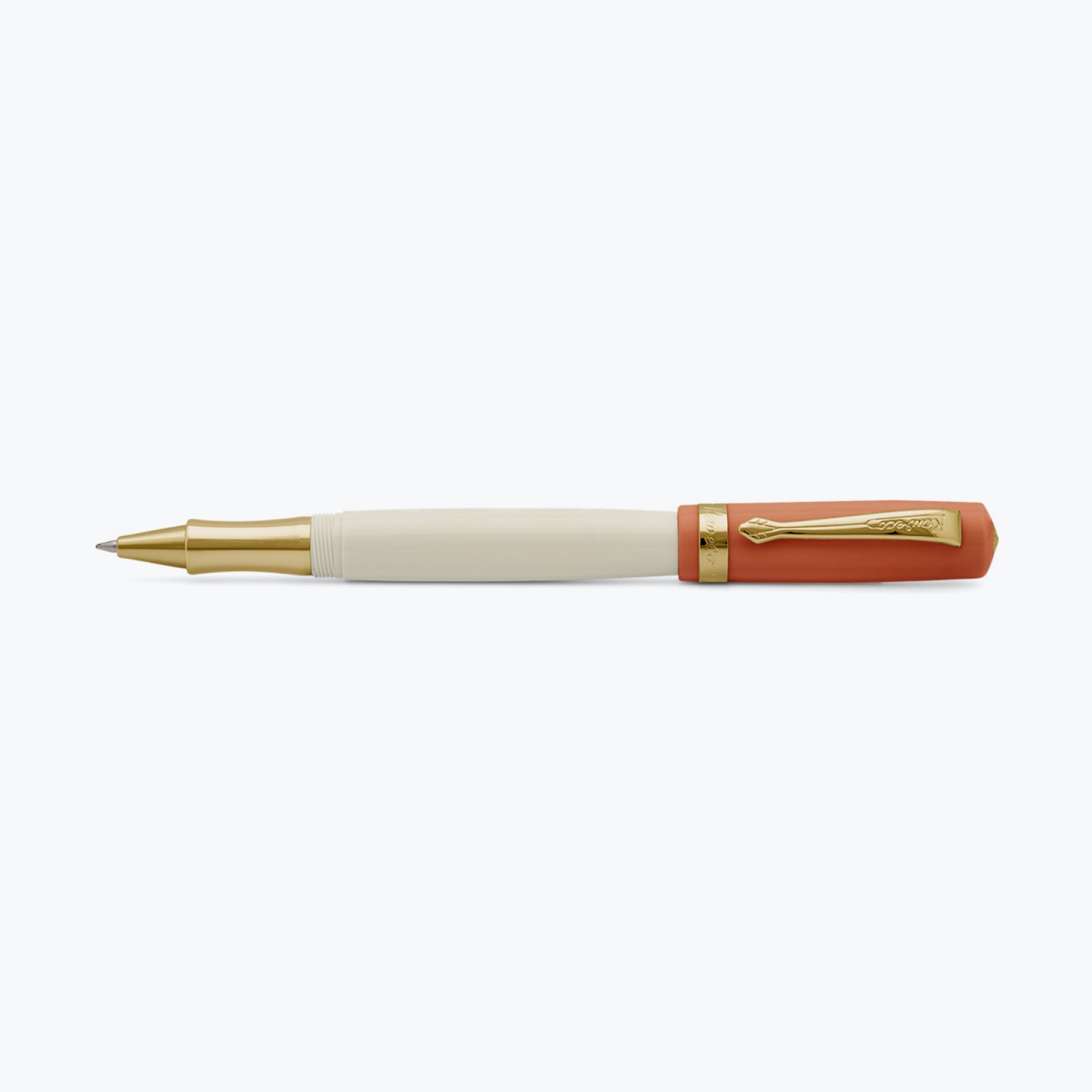 Burnt orange and cream barrel Kaweco Student rollerball pen, with cap posted