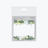 Midori sticky sheets with die-cut leafy decorations along the top and bottom border